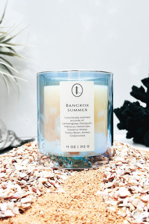 Bangkok Summer Candle 11 oz | Luxury Scented Candle in an iridescent blue candle jar.