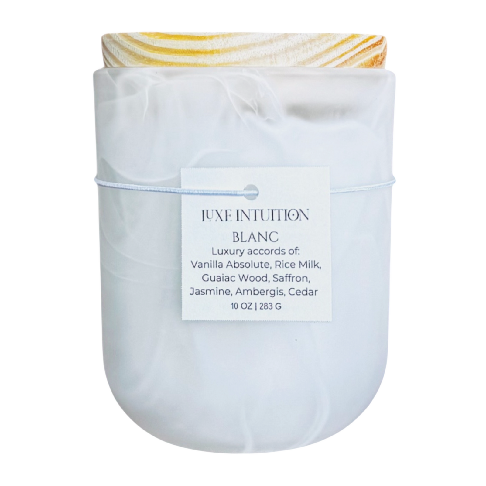 soft vanilla scented wood wick candle in a white marble vessel with a wood lid.