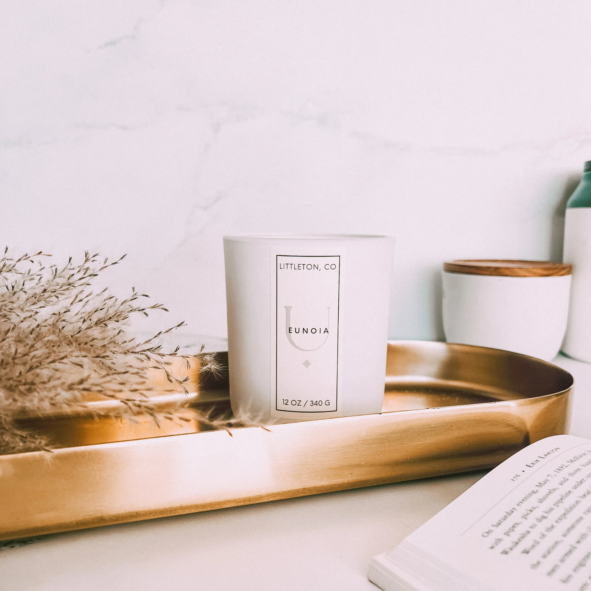 Eunoia Candle Collection featuring a musky, smokey, and modern fragrance for a luxury home.