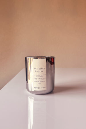 Waterton Canyon Wooden Wick Candle, an opulent watery floral scent.
